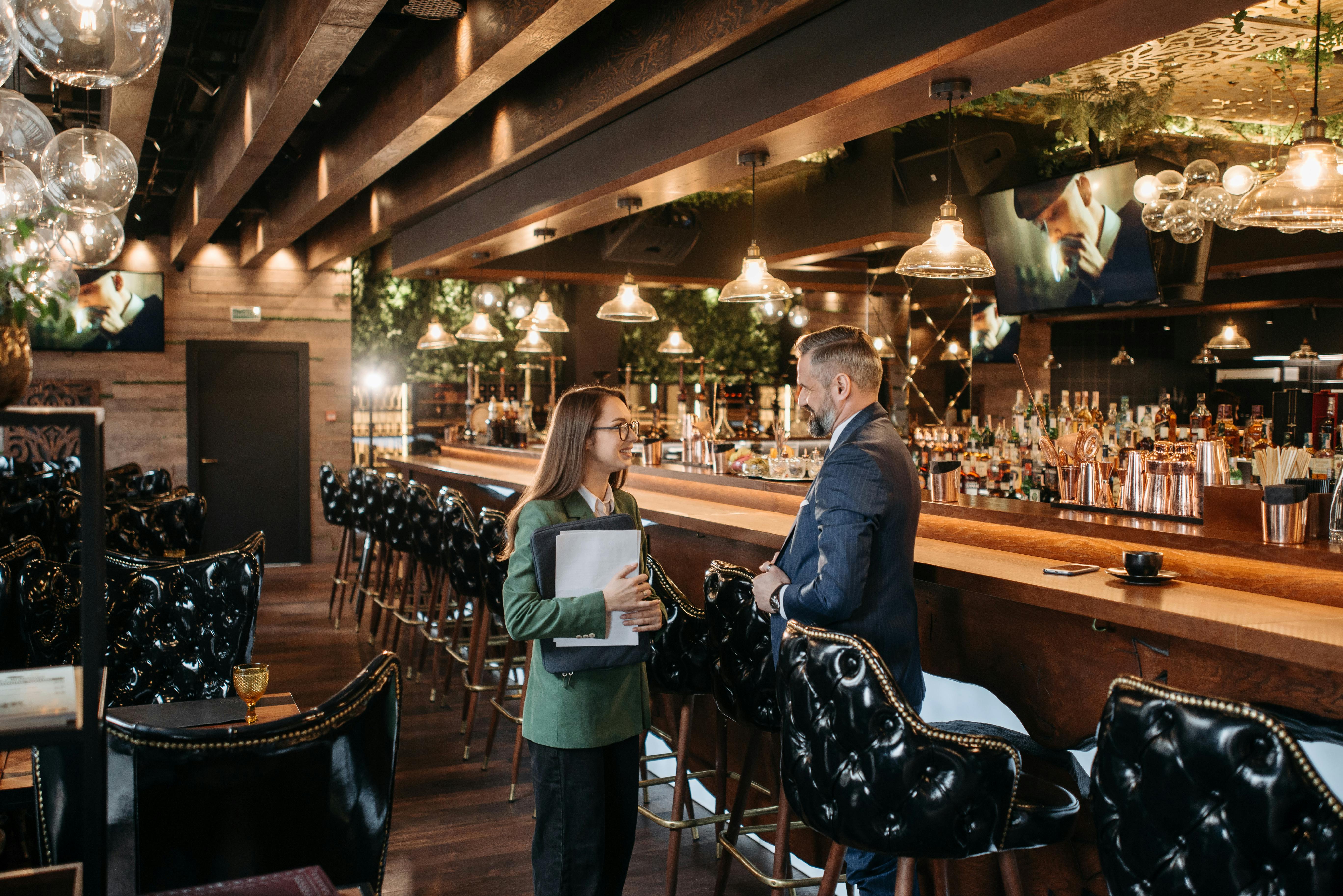 Hospitality partners collaborating in a venue